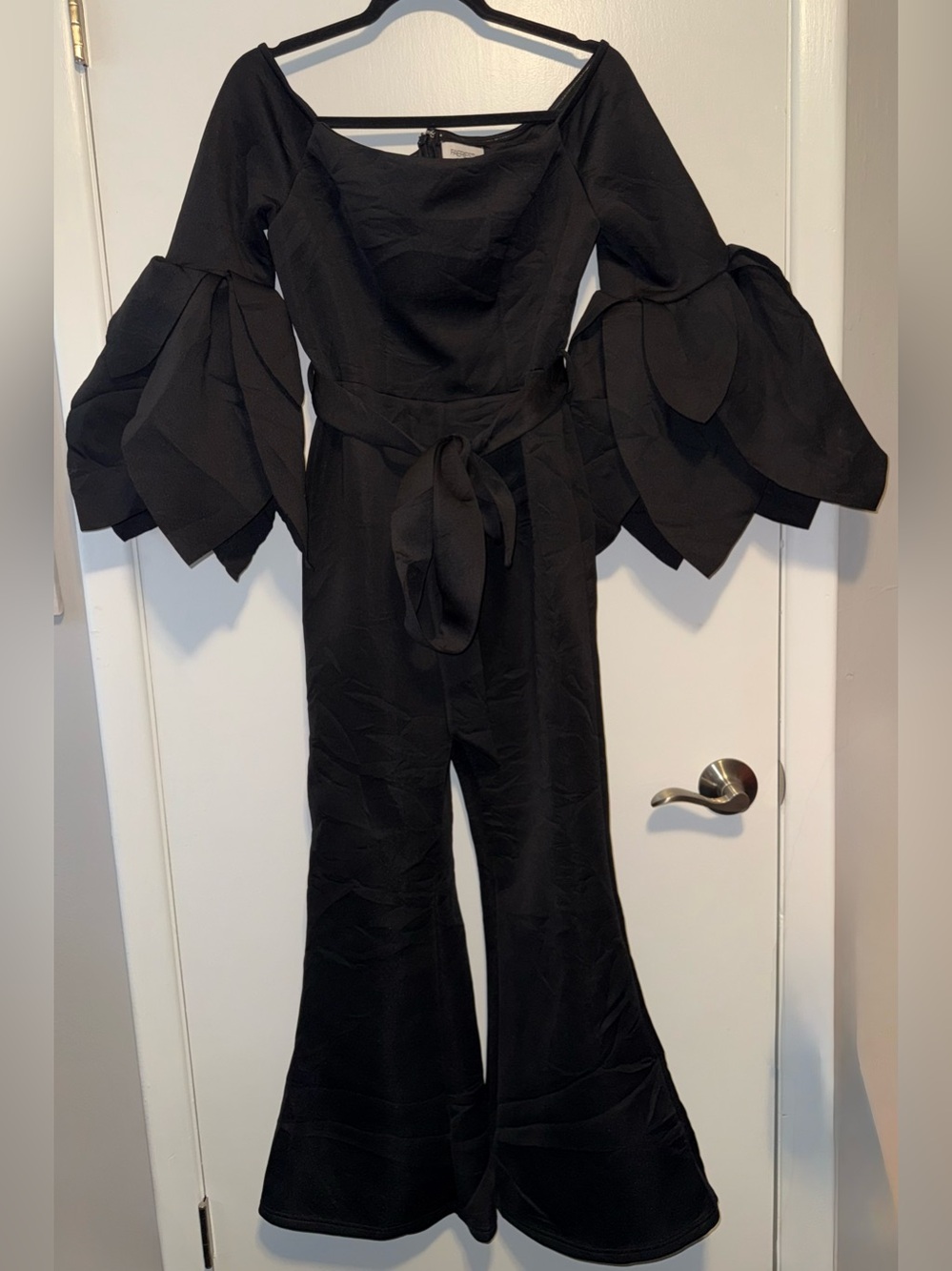 Elegant Black Off-Shoulder Jumpsuit with Statement Bell Petal Sleeves